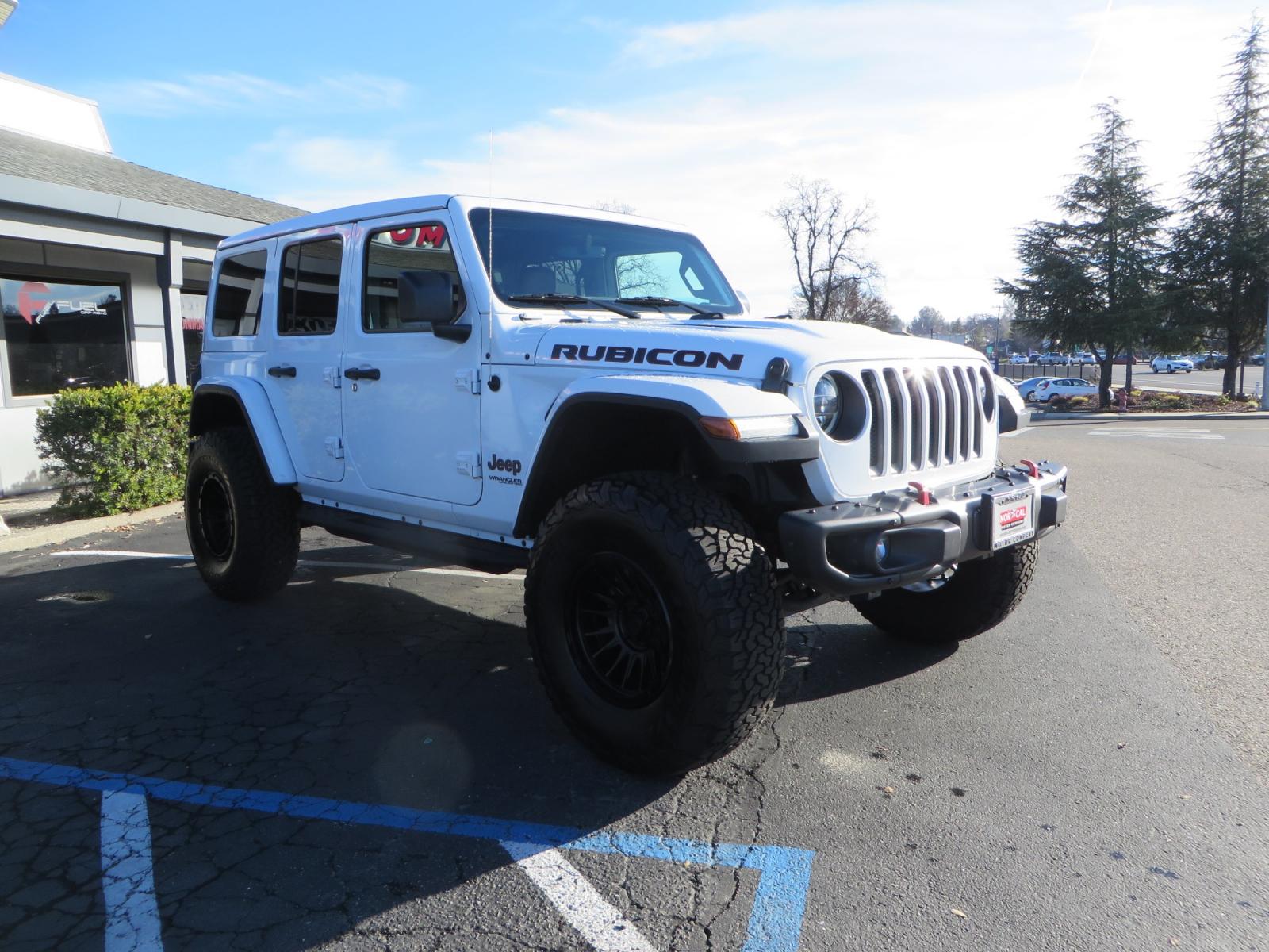 2020 White /TAN Jeep Wrangler Unlimited Rubicon (1C4HJXFG8LW) with an 3.6L V6 DOHC 24V FFV engine, 6A transmission, located at 2630 Grass Valley Highway, Auburn, CA, 95603, (530) 508-5100, 38.937893, -121.095482 - 3" Zone offroad suspension system, Fox adventure series shocks, rocksliders, Teraflex HD tire relocation, Mopar HD tailgate hinge, 17" KMC wheels, and 37" BFG KO2 tires. - Photo #2